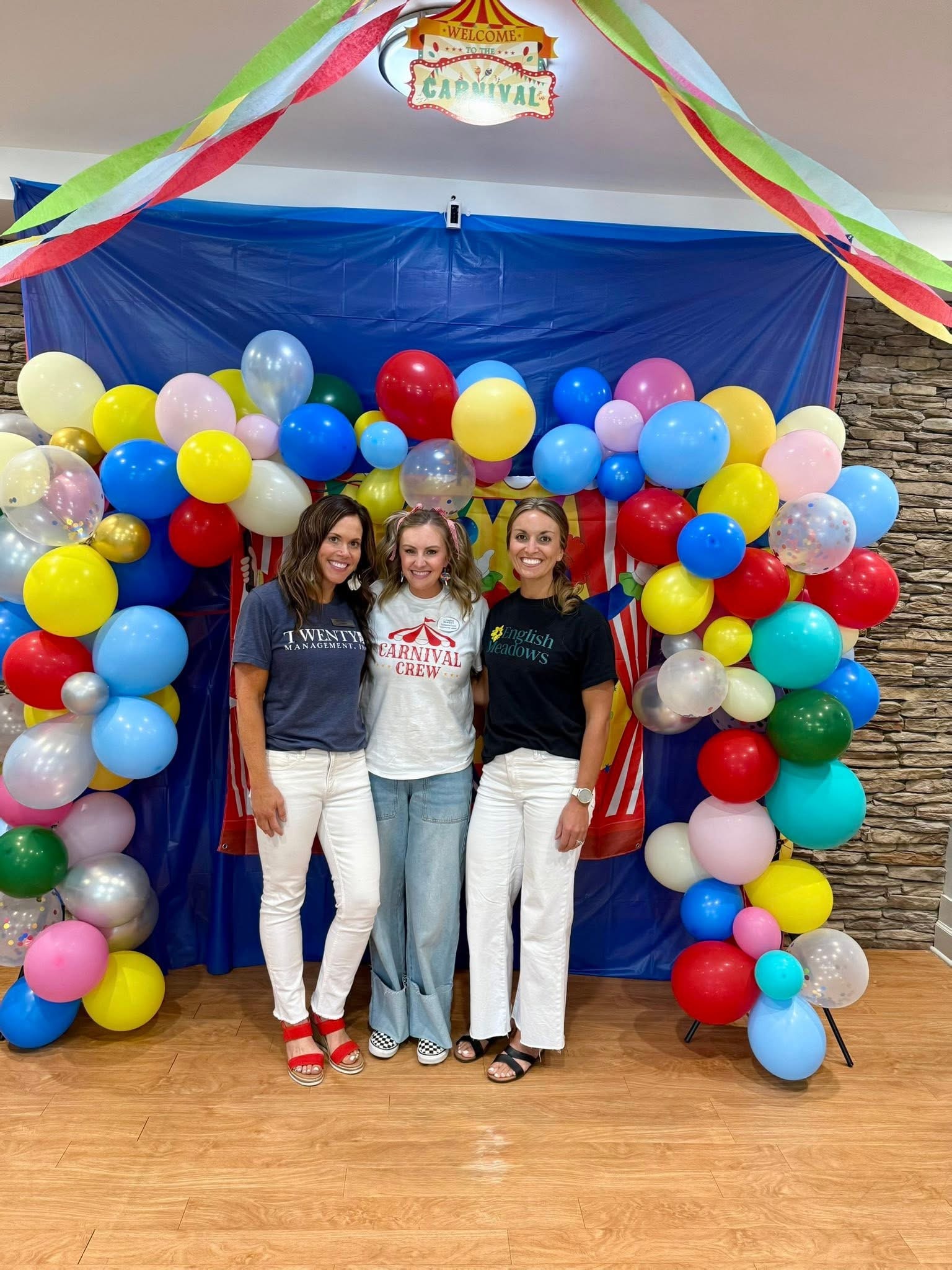 Three team members at carnival event